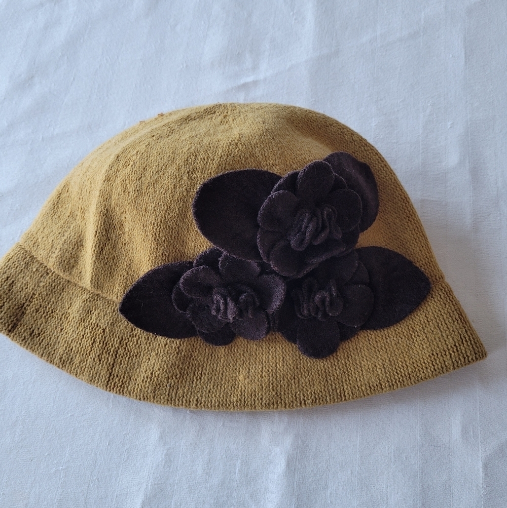 a AgustTan Hat with Dark Brown Floral Accents One Size